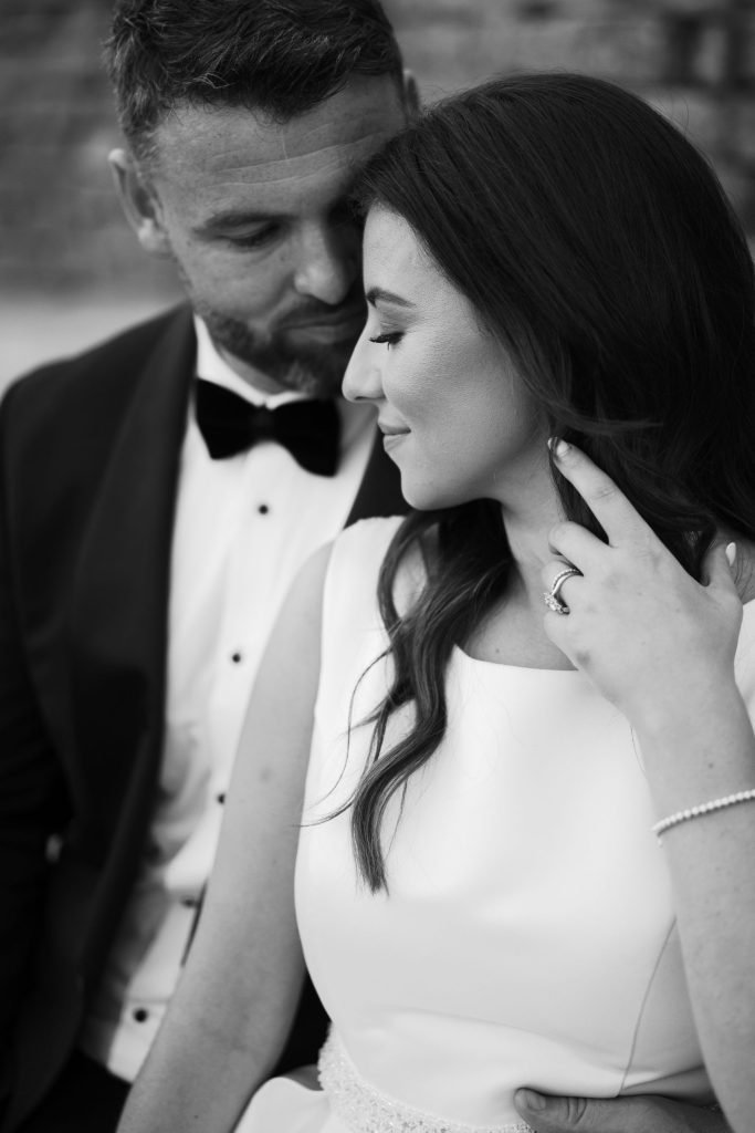 Couple close together, in black and white, wedding at Casa de la Era in Marbella