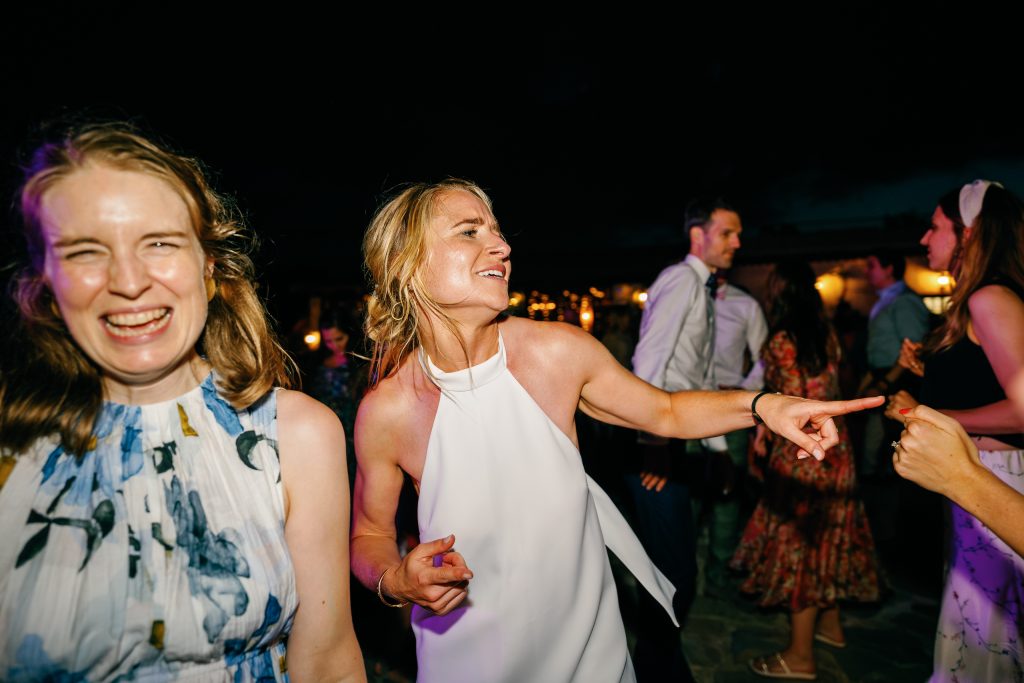 Bride and a friend laughing at the party, Casa de la Era wedding in Marbella