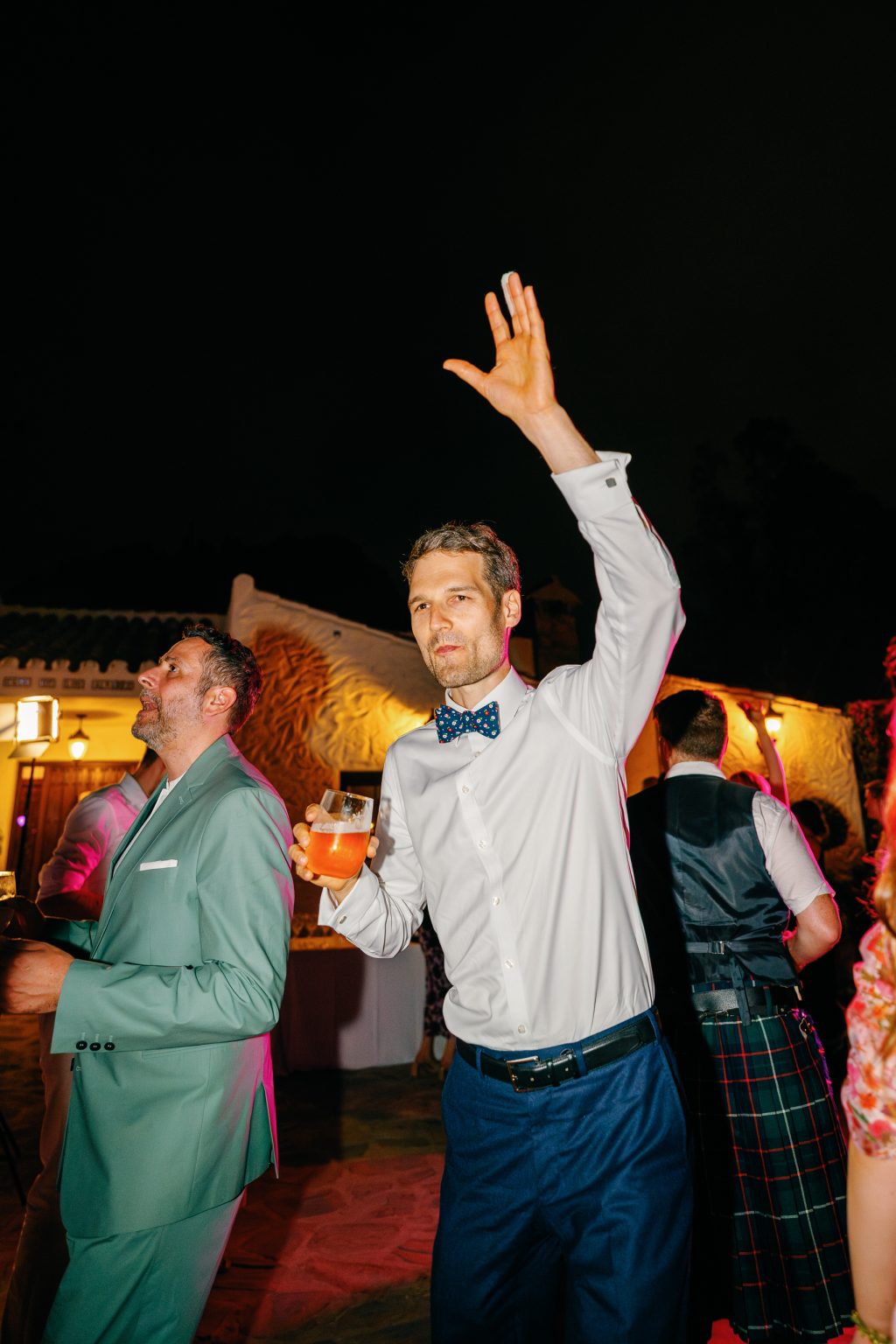 Guest dancing with his arm up, Casa de la Era wedding in Marbella