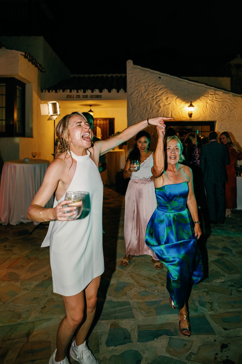 Bride dancing with her friends at night, Casa de la Era wedding in Marbella