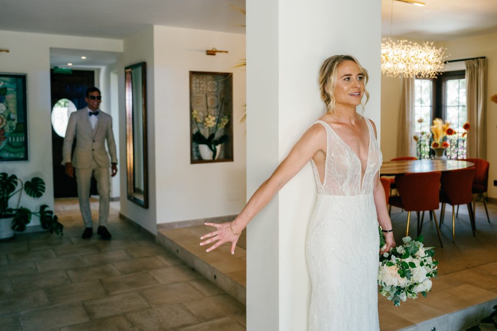 Bride walking in for the first look, Casa de la Era wedding in Marbella