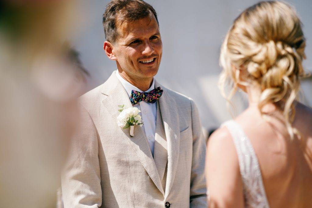 Vici and Martin facing each other at the ceremony, Casa de la Era wedding in Marbella