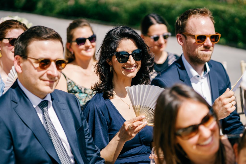 Guests smiling during the ceremony, Casa de la Era wedding in Marbella