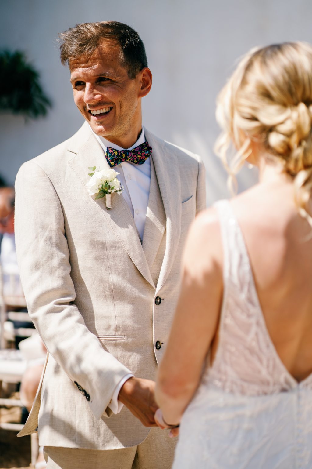 Vici and Martin sharing a laugh at the altar, Casa de la Era wedding in Marbella