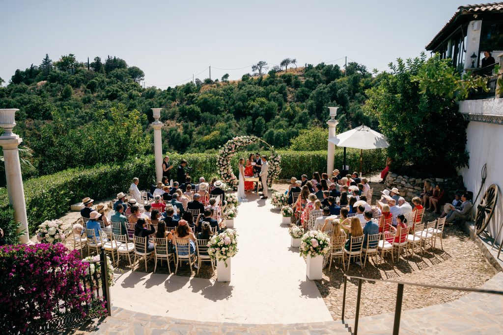 Wide view of the ceremony set-up with guests, Casa de la Era wedding in Marbella