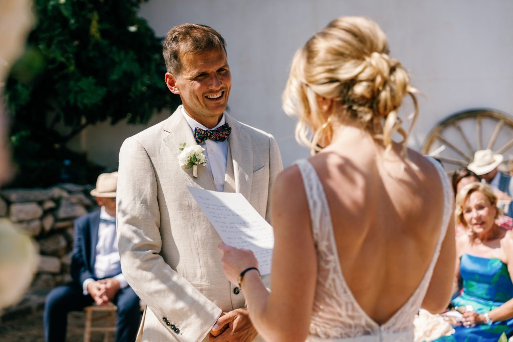 Groom smiling at the bride during the vows, Casa de la Era wedding in Marbella
