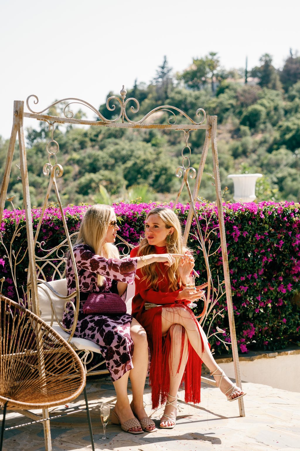 Guests relaxing on a swing seat, Casa de la Era wedding in Marbella
