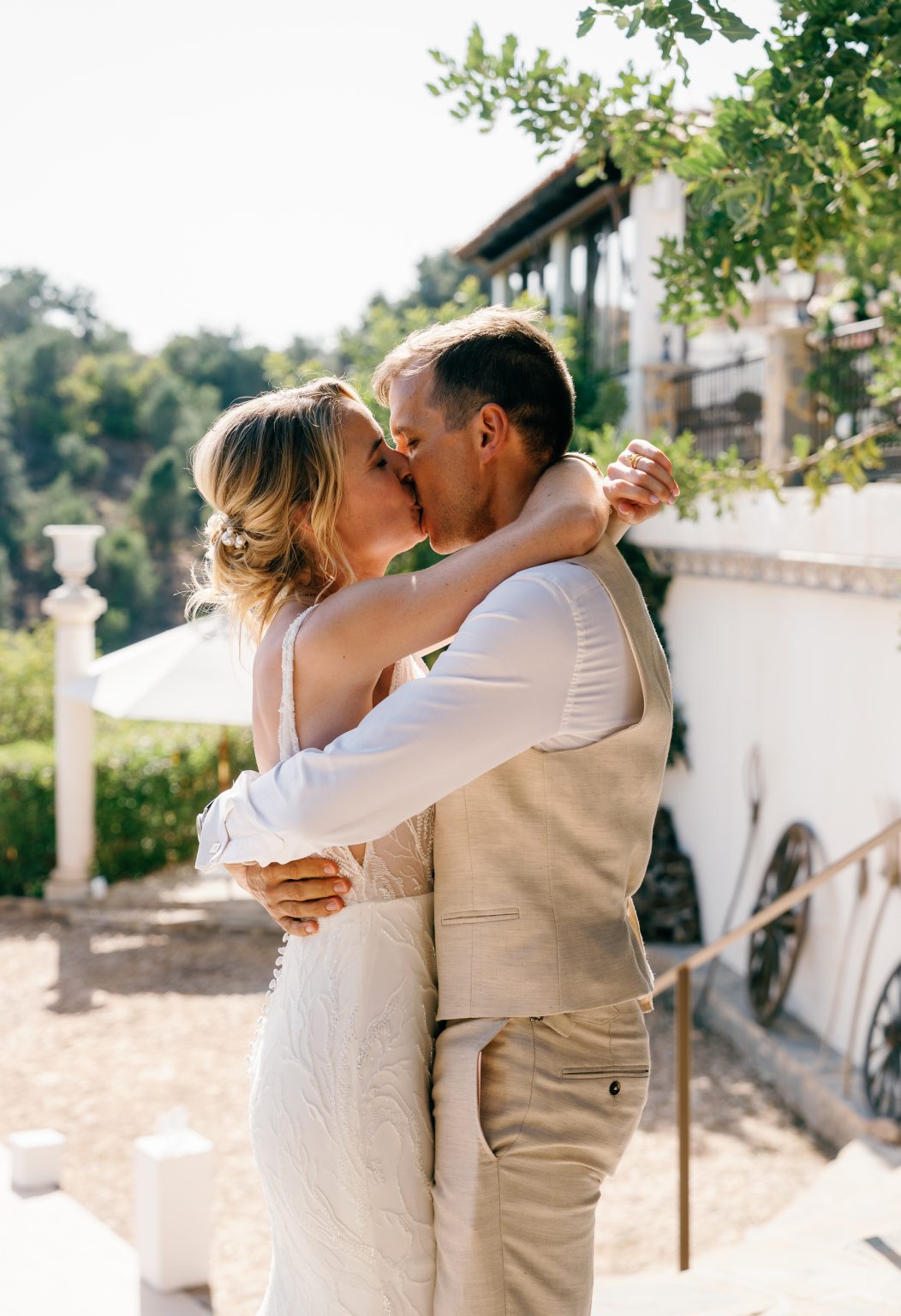 Couple portrait with a kiss in the garden, Casa de la Era wedding in Marbella