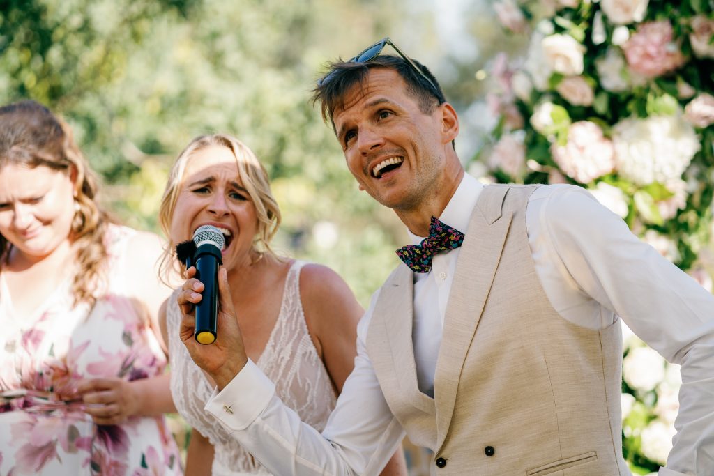 Vici and Martin giving a speech together, Casa de la Era wedding in Marbella
