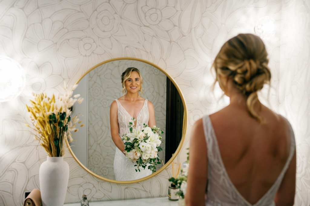 Bride ready in front of the round mirror, Casa de la Era wedding in Marbella