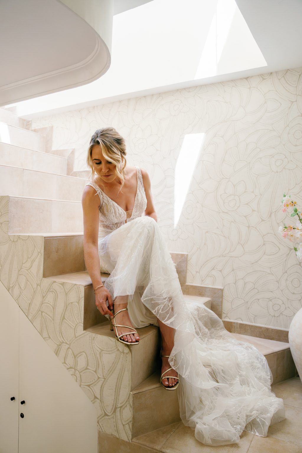Bride on the white stairs before the ceremony, Casa de la Era wedding in Marbella