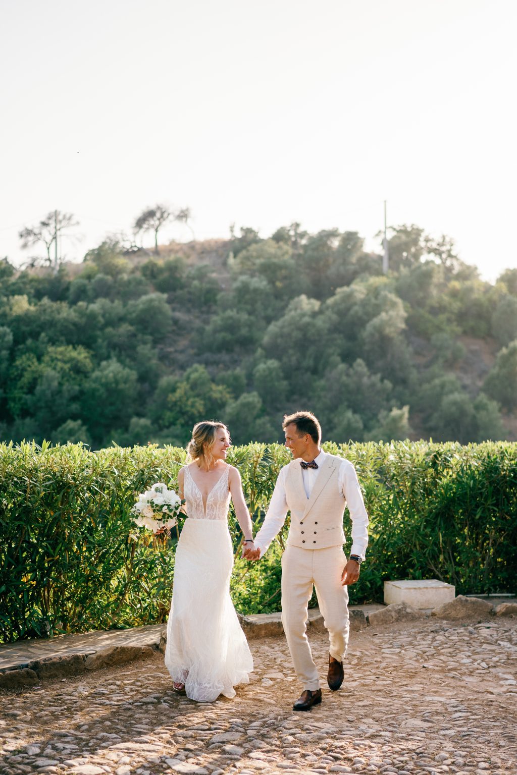 Couple walking together through the gardens, Casa de la Era wedding in Marbella