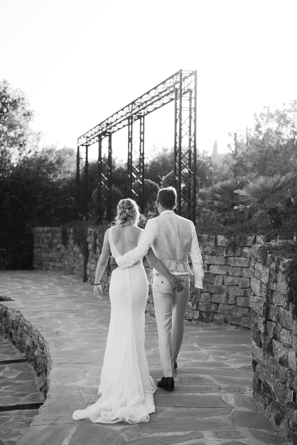 Black and white photo of the couple walking, Casa de la Era wedding in Marbella