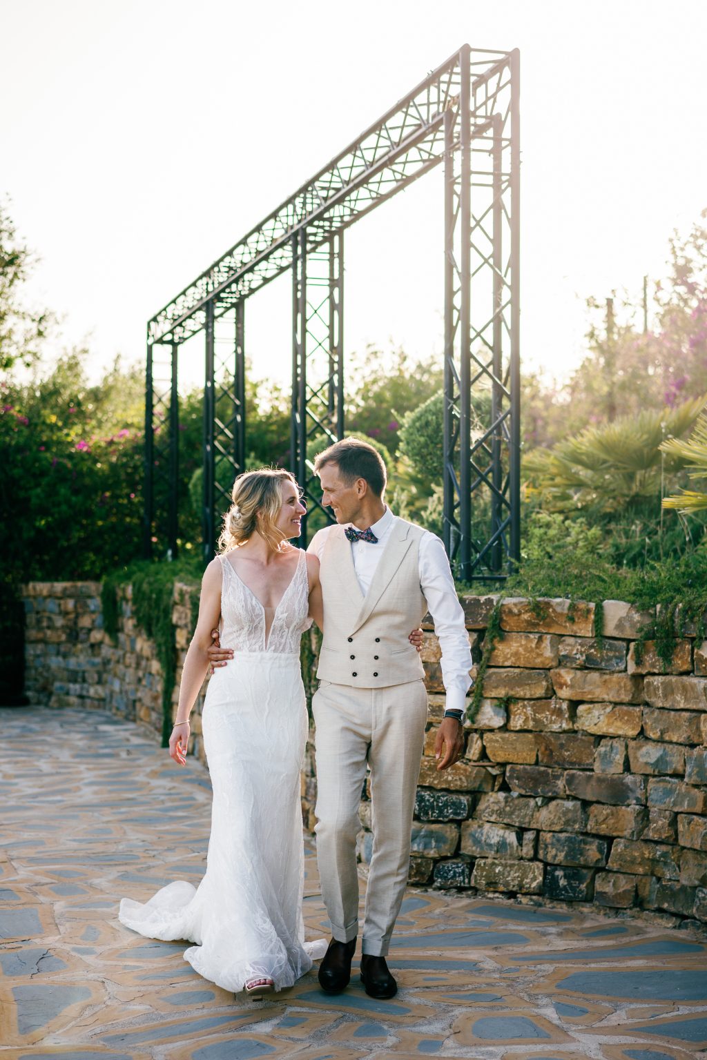 Newlyweds walking hand in hand, Casa de la Era wedding in Marbella