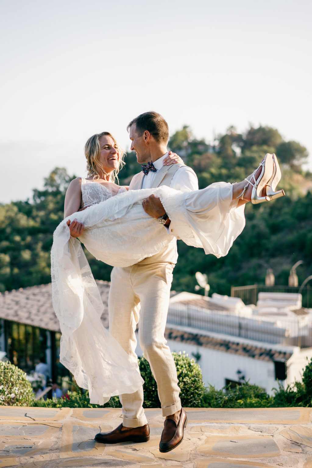 Groom carrying the bride, Casa de la Era wedding in Marbella