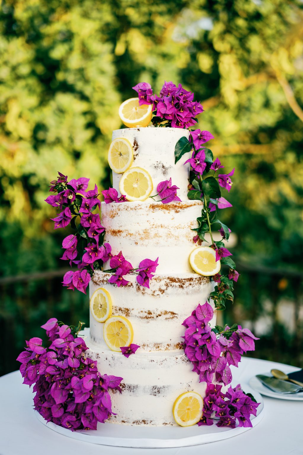 Wedding cake with purple flowers, Casa de la Era wedding in Marbella