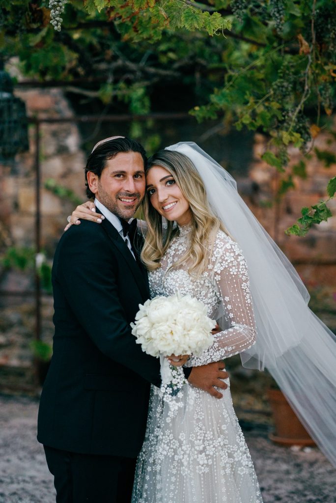 Couple portrait by the ruins of the foundry, Jewish wedding at Finca La Concepción in Marbella